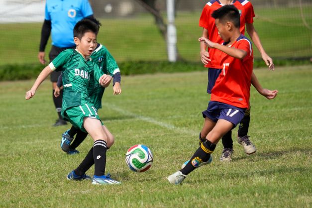 淡海國小（綠衣）（圖：台灣山葉機車提供） 